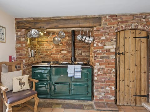 Kitchen/diner with French leading to garden | Wherryman’s Cottage, Coltishall