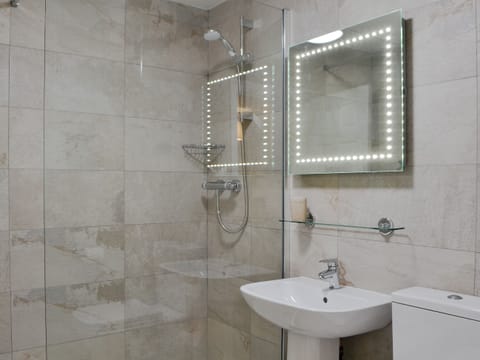 Tiled shower room | 11 Elm Court - Greta Grove Apartments, Keswick