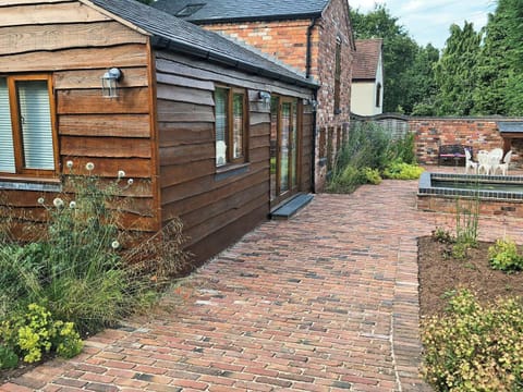 Lovely courtyard with sitting-out area | The Hayloft, Kidderminster
