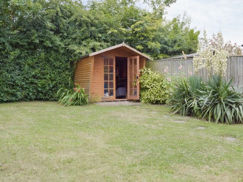 Enclosed lawned garden | Dormers, Leiston