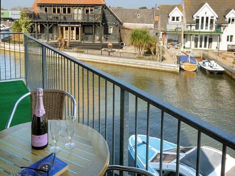 Balcony overlooking the water | Coot - Daisy Broad Lodges, Wroxham