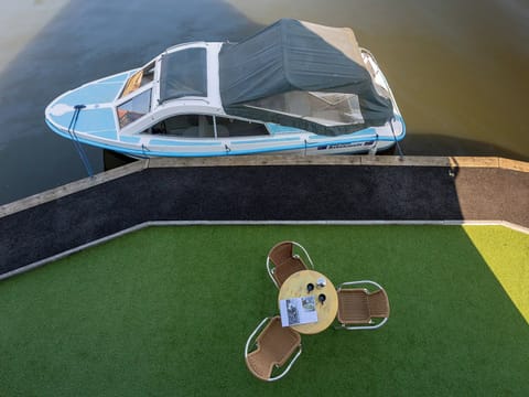 Seating area by the water | Coot - Daisy Broad Lodges, Wroxham
