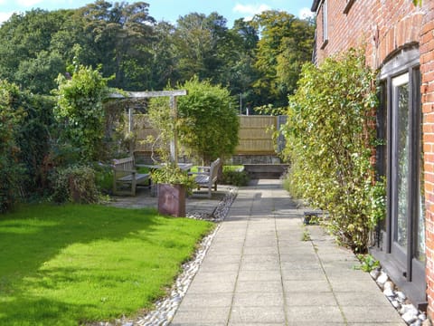 Patio area with outdoor seating | The Coach House, East Somerton