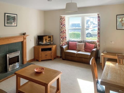 Spacious living room and dining area | 1 Lonsdale House - Greta Grove Apartments, Keswick