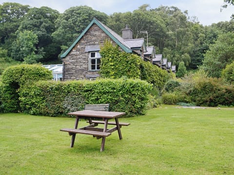 Exterior and garden | Hen Stabl, Arthog, near Dolgellau