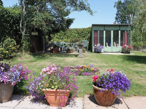 Garden with summerhouse and seating area | Sandringham Heights, Paignton