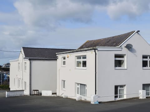 Quayside is located at the rear of the building on the first floor. There is ample private parking space | Quayside, Cemaes Bay