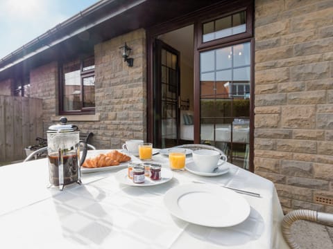 Sitting-out-area with garden furniture | Cleet&rsquo;s Retreat, Seahouses