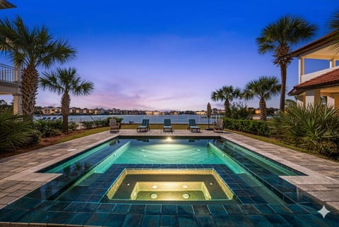 Paradise Cove | Sunset views of pool, lake, and gulf