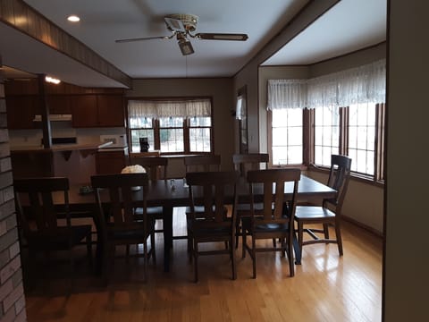 Dining room with a gorgeous view of the lake and the front patio.