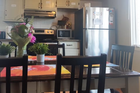 Fully equipped kitchen and large sit in dining area  view to park 