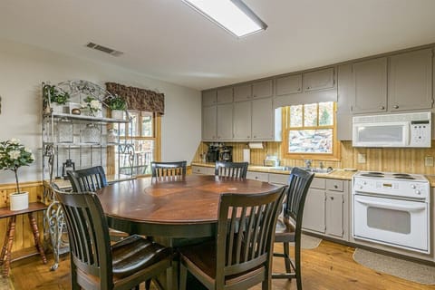 Round dining table with 6 chairs