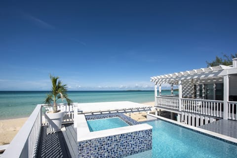 Welcome to Caribbean Sandcastle, a stunning beachfront house with pool and hot tub direclty on a mile-long Caribbean beach.