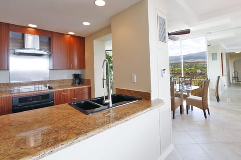 Kitchen and dining room with view of West Maui Mountains