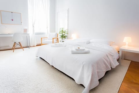 Large bedroom with king size bed (180x200) and pull out sofa and a crib
