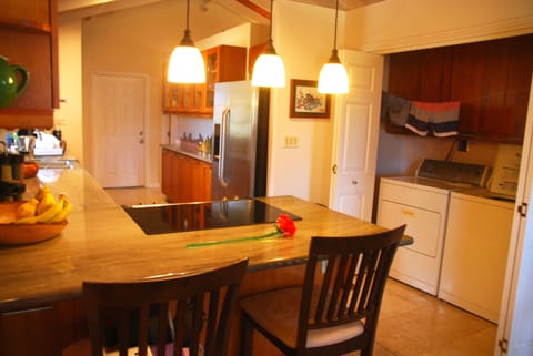 Throw your clothes in the washer & dryer after a day at the beach.