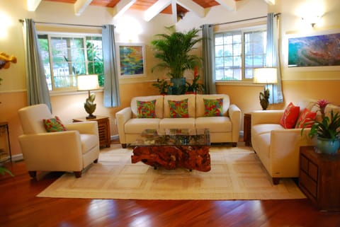 Relax in this charming, spacious home with plenty of natural light & plants.