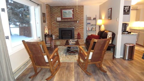 Living Room. Gas Fireplace insert shown has been replaced with a new unit!