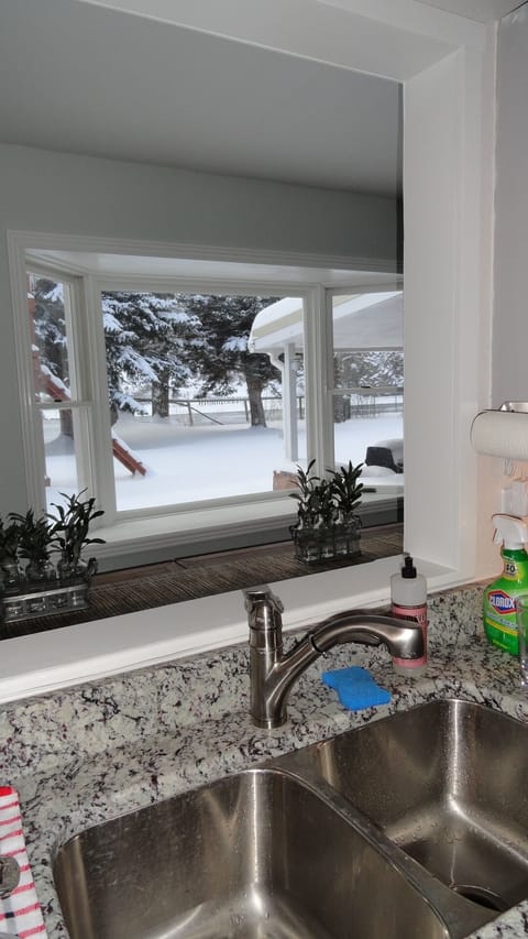 Great view of the river from the kitchen sink! Also a dishwasher to take the burden of the stuff!