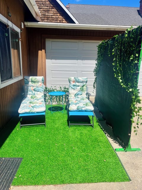 Private outdoor space with comfy loungers.