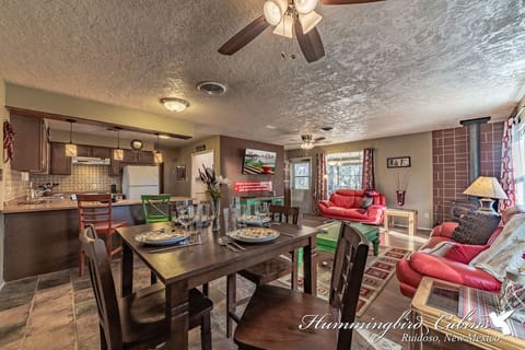 Kitchen, dining area and living room.