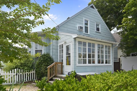 Enclosed rear porch off kitchen.  
