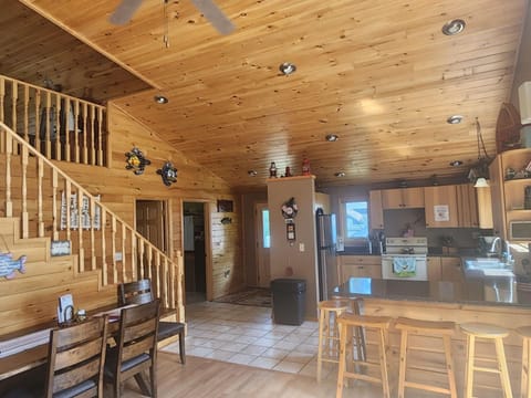 Kitchen, entry way, laundry room and bedroom on main floor.  Loft up the stairs.