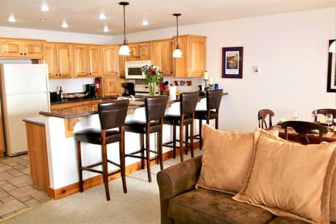 Great room with fully equipped kitchen with platters, bbq tools, toaster.