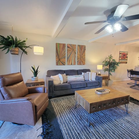 Living room features a comfortable queen size sleeper sofa 
