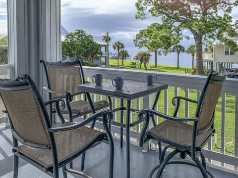Ochlockonee Bay view from wrap-around balcony, table and 3 chairs