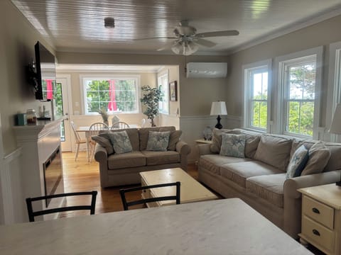 Living area with bay views and fireplace