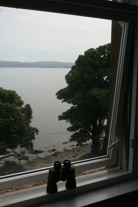 View onto beach from bedroom window