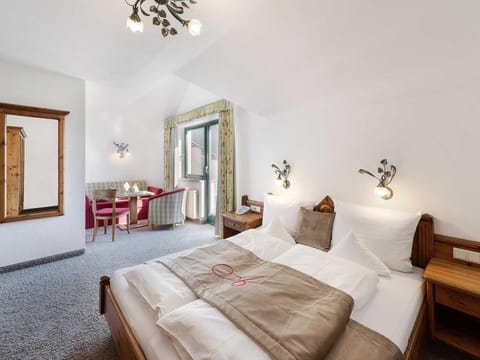 AlpenSchlössl family room - Hotel AlpenSchlössl Apartment in Salzburgerland