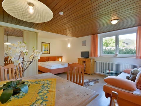 App. 3: Living room with kitchen - Apartment house Bambi Apartment in Ellmau