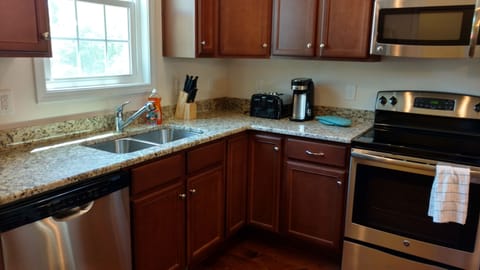 kitchen has all necessities / appliances 
paper towels, dish soap included