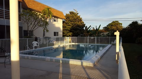 Sunset swim after hot day on golf course.......