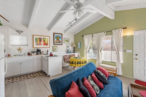 Great room looking out to private deck and barbecue area.