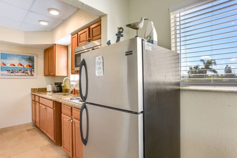 Galley Style Kitchen with Cooktop (no oven), Microwave and Fridge