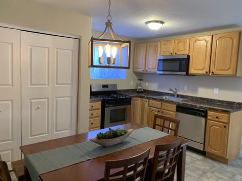 Dining/Kitchen with stainless steel appliances!