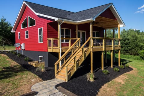 Charming exterior of the Red Pine Cottage.