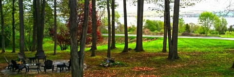Enjoy the evening relaxing here on this slate patio with firepit and great views