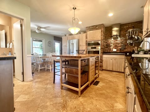 Spacious, bright, well-stocked kitchen fully-equipped for food prep