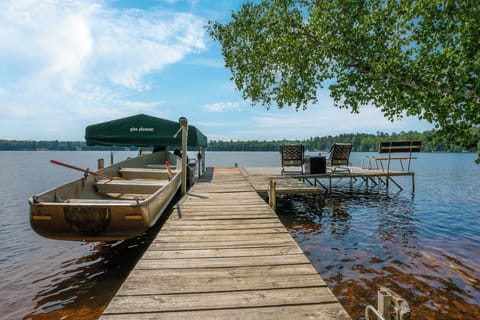 Expanded dock with our rowboat, fishing boat, + lots of room for your boat(s)!