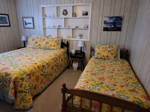 New 40" smart HDTV in Master bedroom queen size bed with twin bed and 1/2 restrm