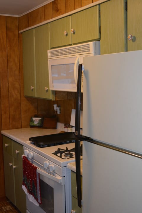 Kitchen - Fridge, Stove, Microwave, coffee pot, toaster