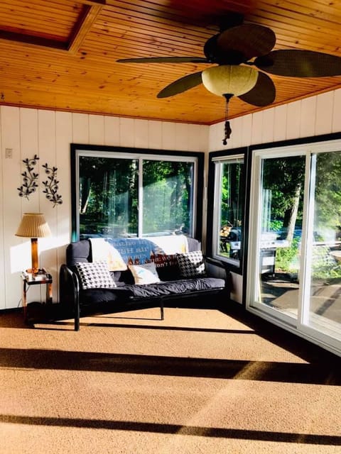 three season room with a futon for additional sleeping options