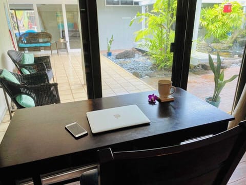 Or you can move the desk to one of the bedrooms. The owner worked here for 3 months facing koi pond