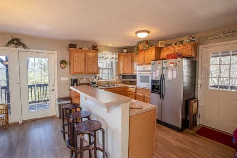 Kitchen with Side-by-side Stainless Fridge