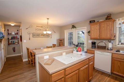 Kitchen with Side-by-side Stainless Fridge