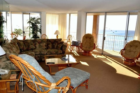 Our spacious living room sports full views of the ocean and a fold out couch.